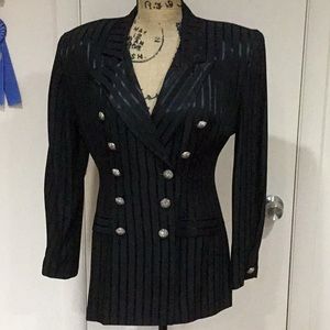 Black suit coat and paints